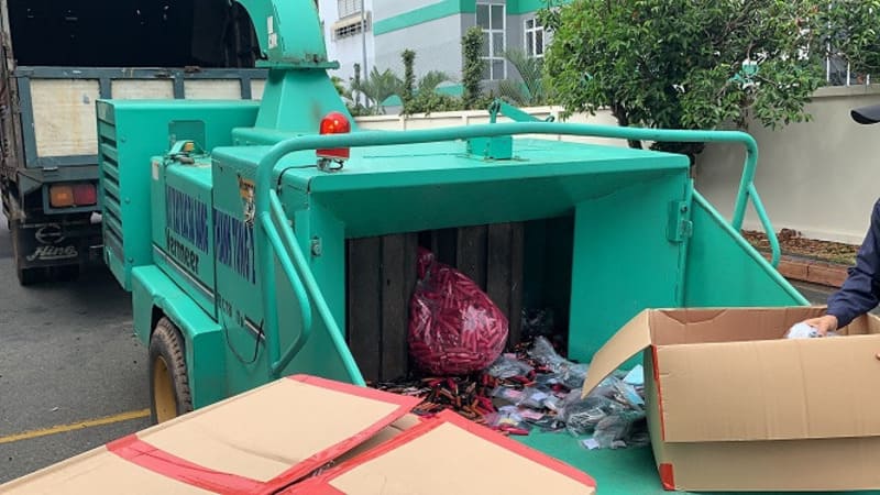 Vietnamese garbage crusher handling unauthorized goods