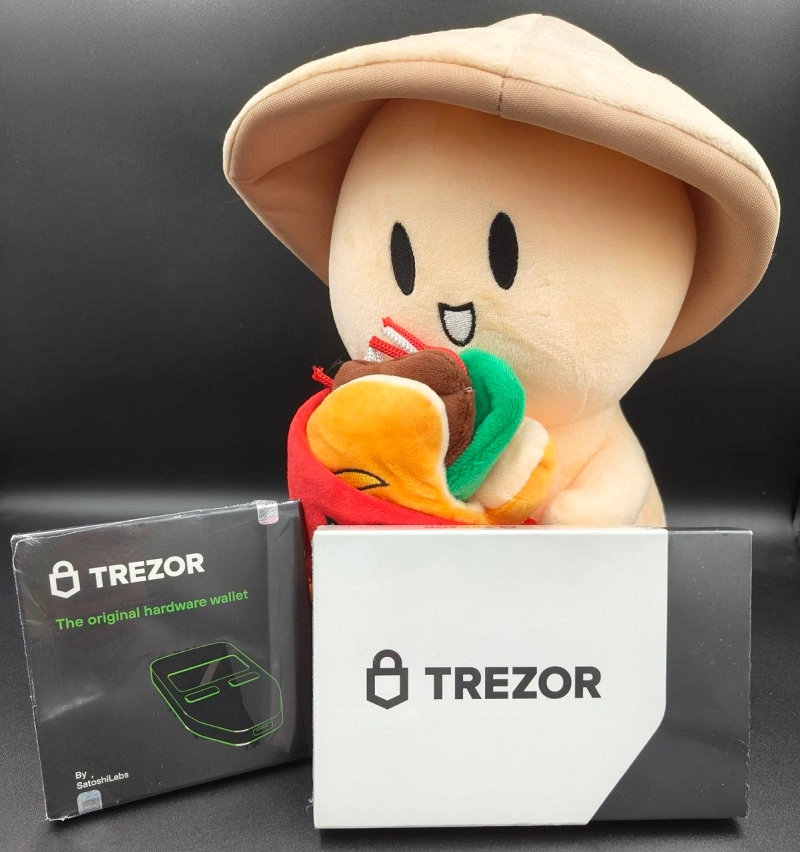 Trezor hardware wallet boxes with plush figure