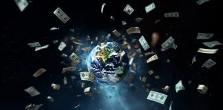 Dollar bills flying around the globe