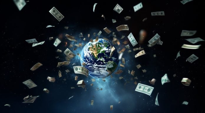 Dollar bills flying around the globe